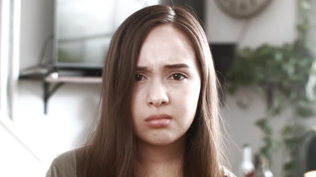 Angry Young Woman Looking Into Camera