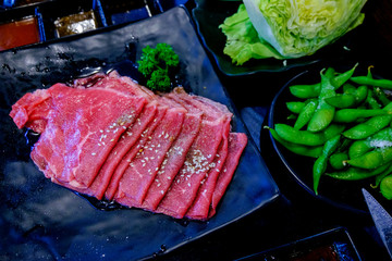 Fresh beef fillet with ingredients in cooking
