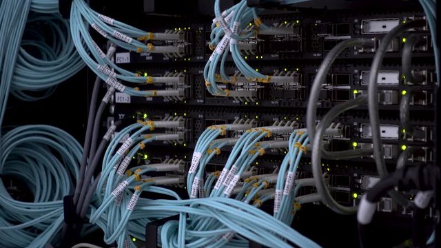 Servers racks close up in Modern data center. Cloud computing datacenter server room.