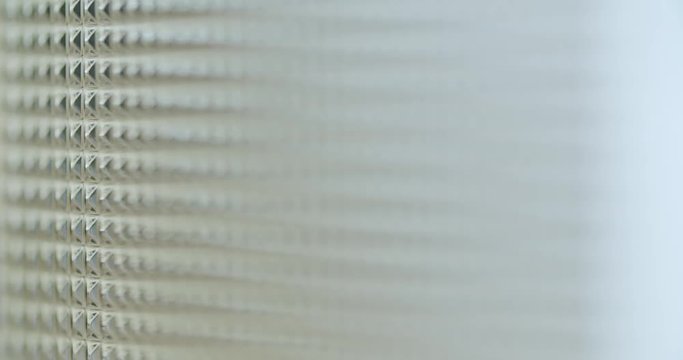 Close view of embossed acrylic glass.
