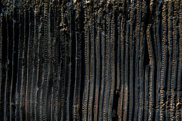 black rubber impact bumper barrier possible made from old tires