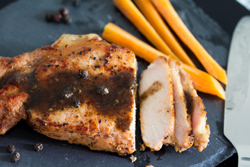 Roasted pork steak on plate