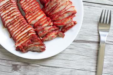  Roasted red pork on white plate