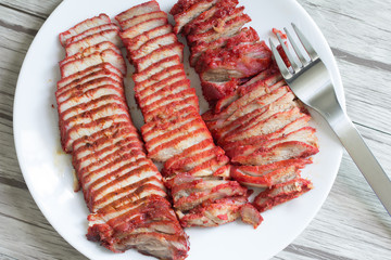  Roasted red pork on white plate