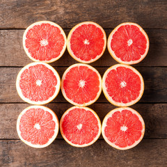 Fresh grapefruits on wooden table. Top view