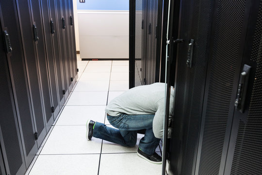 Technician in a server room.