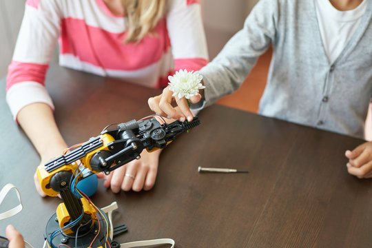Two kids learning more about robotics