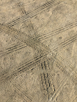 tire marks in the sand