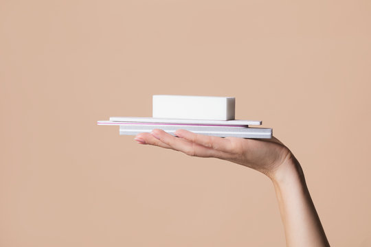 Woman Holding Nail Files