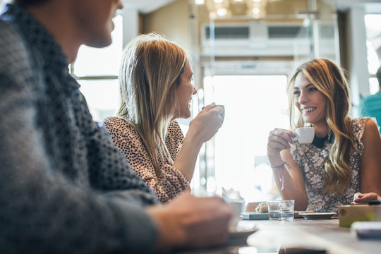 Friends Drinking Coffee Together