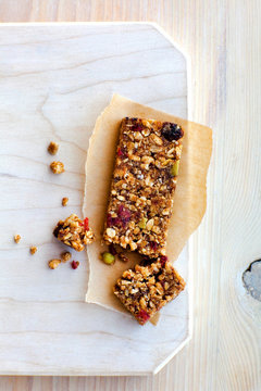 Healthy Granola Bar on White Wood