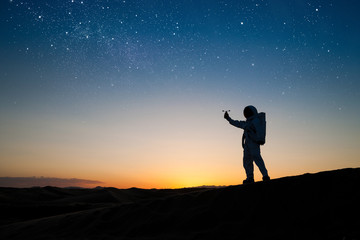 Astronaut Measuring Wind Speed on Mars