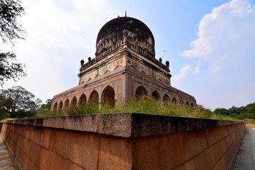 The Qutb Shahi Tombs are located in Hyderabad, India and they contain the tombs and mosques built by the various kings of the Qutb Shahi dynasty. They were built between the 16th and 17th centuries.