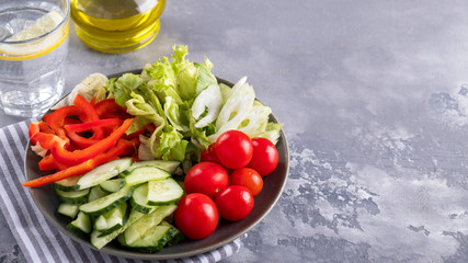 Assorted of fresh vegetables on a plate. Healthy concept. Space for text