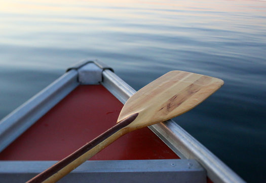 A Canoe Paddle Resting On A Canoe Bow