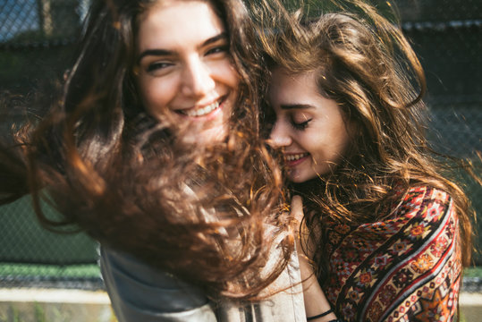 Young wild and free female friends outdoors