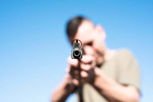 man with a shotgun