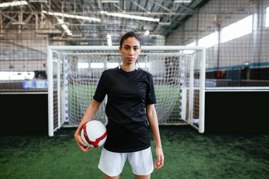 Female soccer player in indoor football.