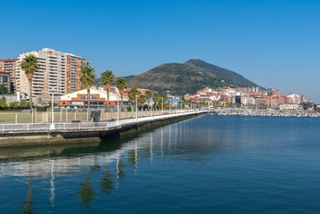 Panorama of Santurtzi with Serantes mountain as background from Iron Pier of Portugalete, Basque Country, Spain