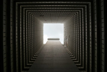 Squared residencial building photograph from the courtyard in Hong Kong
