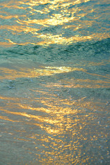 Ocean surface at sunset time. Abstract natural background.