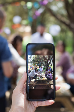Woman take a photo of her big family