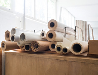 Pile of rolled plotter paper
