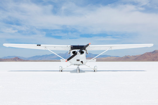 Single engine airplane parked on Bonneville Salt Flats, Utah