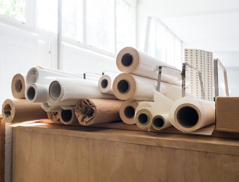Pile of rolled plotter paper