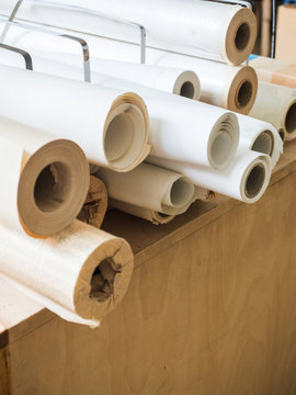 Pile of rolled plotter paper