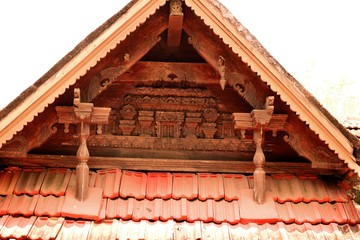 Fototapeta na wymiar Details of wooden work in a traditional Kerala temple