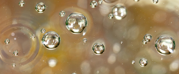 Bubbles of air on the surface of water as an abstract background