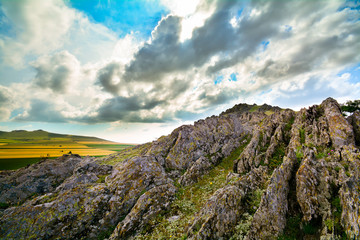 Fototapeta na wymiar mountain landscape with beautiful sky in Dobrogea, Romania