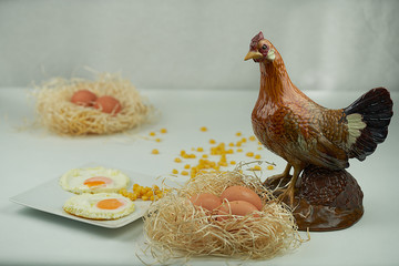 Fresh eggs and fried eggs