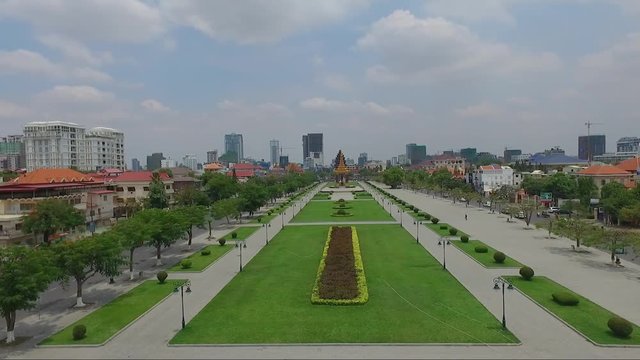 Panoramic view of Independence park in the middle of King Sihanouk boulevard, with King father Norodom monument and Independence monument, Phnom Penh, Cambodia