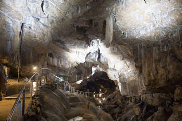 Interior View of a lit up cavern showing rock formation