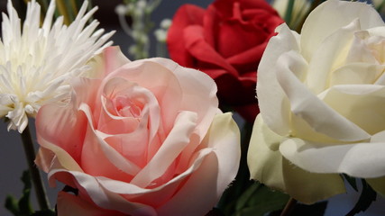 Fake pink and white roses 