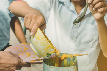 Students join melting cast candle offer to temple for Buddhist Lent Day, The tradition of the...