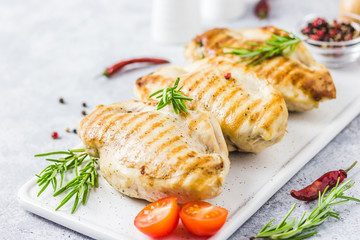Feta spinach tomatoes stuffed chicken fellet, grilled. Selective focus, space for text.