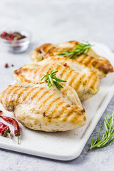 Feta spinach tomatoes stuffed chicken fellet, grilled. Selective focus, space for text.