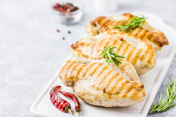 Feta spinach tomatoes stuffed chicken fellet, grilled. Selective focus, space for text.