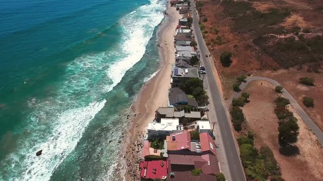 Malibu holiday villas on beautiful coastline above Pacific Ocean, drone view