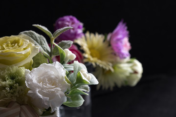 rose bouquet and colorful flowers background