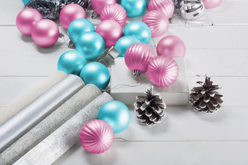 Beautiful gift box and blue and pink Christmas balls