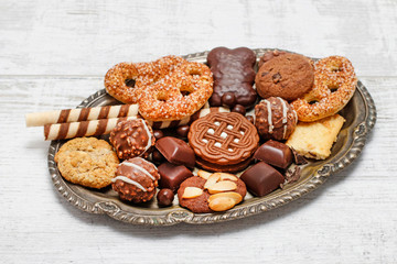 Mix of sweets: cookies, chocolates and pralines.