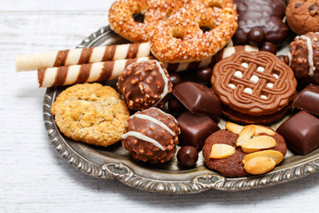 Mix of sweets: cookies, chocolates and pralines.