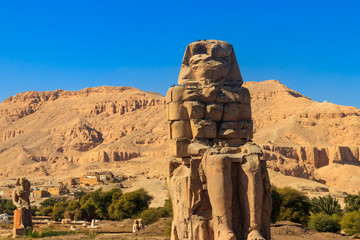 Colossi of Memnon, two massive stone statues of pharaoh Amenhotep III in Luxor, Egypt