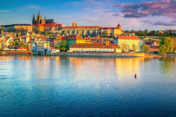 Fototapeta na wymiar Magical colorful sunrise with historic buildings in Prague, Czech Republic