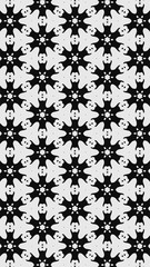 Ornate geometric pattern and two-tone abstract background