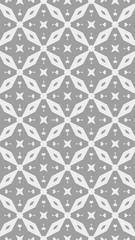Ornate geometric pattern and two-tone abstract background